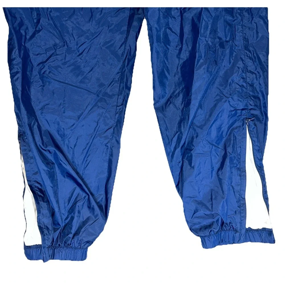 Vintage Nike Youth M (8-10) Blue Nylon Track Pants Zip Ankle Cinch Waist Retro